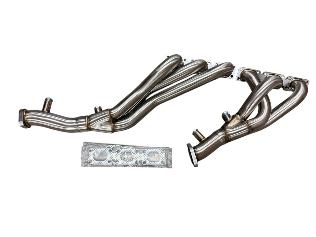 JackSpania Racing exhaust headers for BMW E46 99-00 323/328, E39 528/525, Z3 2.5/3.0 M52 engine, showing polished metal finish