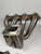 JackSpania Racing B Series turbo manifold for B16, B18, B20 engines, compatible with T3/T4, featuring Precision PTE V-band exhaust parts.