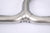 Honda Civic 1.5T sedan valved cat-back performance exhaust system by JackSpania Racing, showcasing polished metal pipes and muffler.