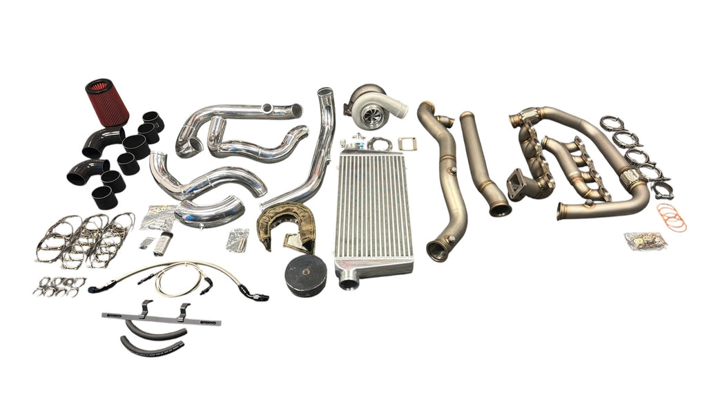 Heavy duty JackSpania Racing turbo kit with intercooler for 1999-2013 Chevy Silverado and GMC Sierra LS trucks, includes turbocharger and piping.