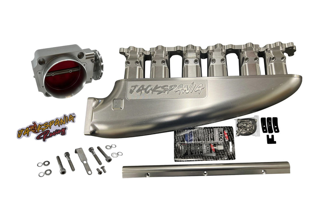 Fully billet 2JZ GTE intake manifold with throttle body and 6-12 injector ports, designed for high-performance engine builds.