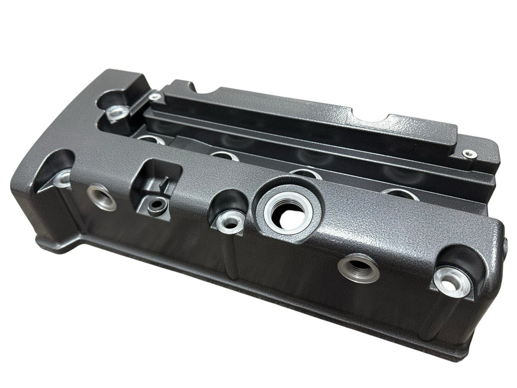 Cast aluminum K Series vented valve cover baffle for Honda Acura K20 K24 engines, designed by Jack Spania Racing.